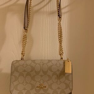 Coach Mini Klare Crossbody bag in signature canvas with gold-tone hardware